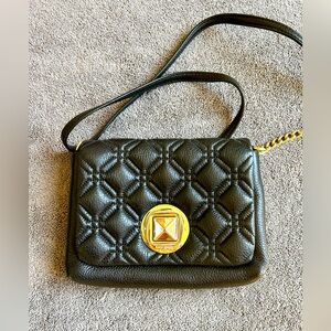 Very good kate spade black crossbody some wear on closure